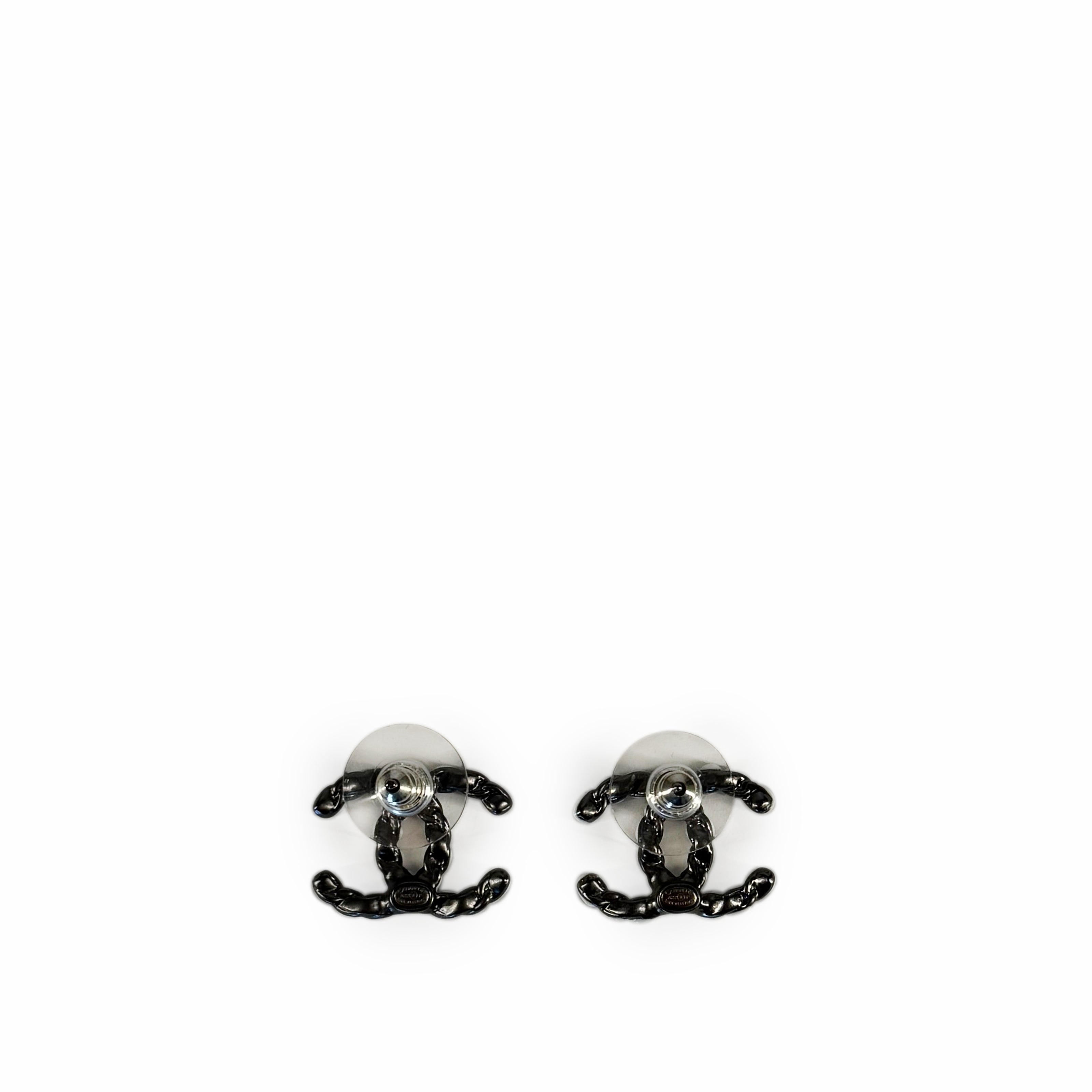 Chanel CC White Metal Gun Earrings