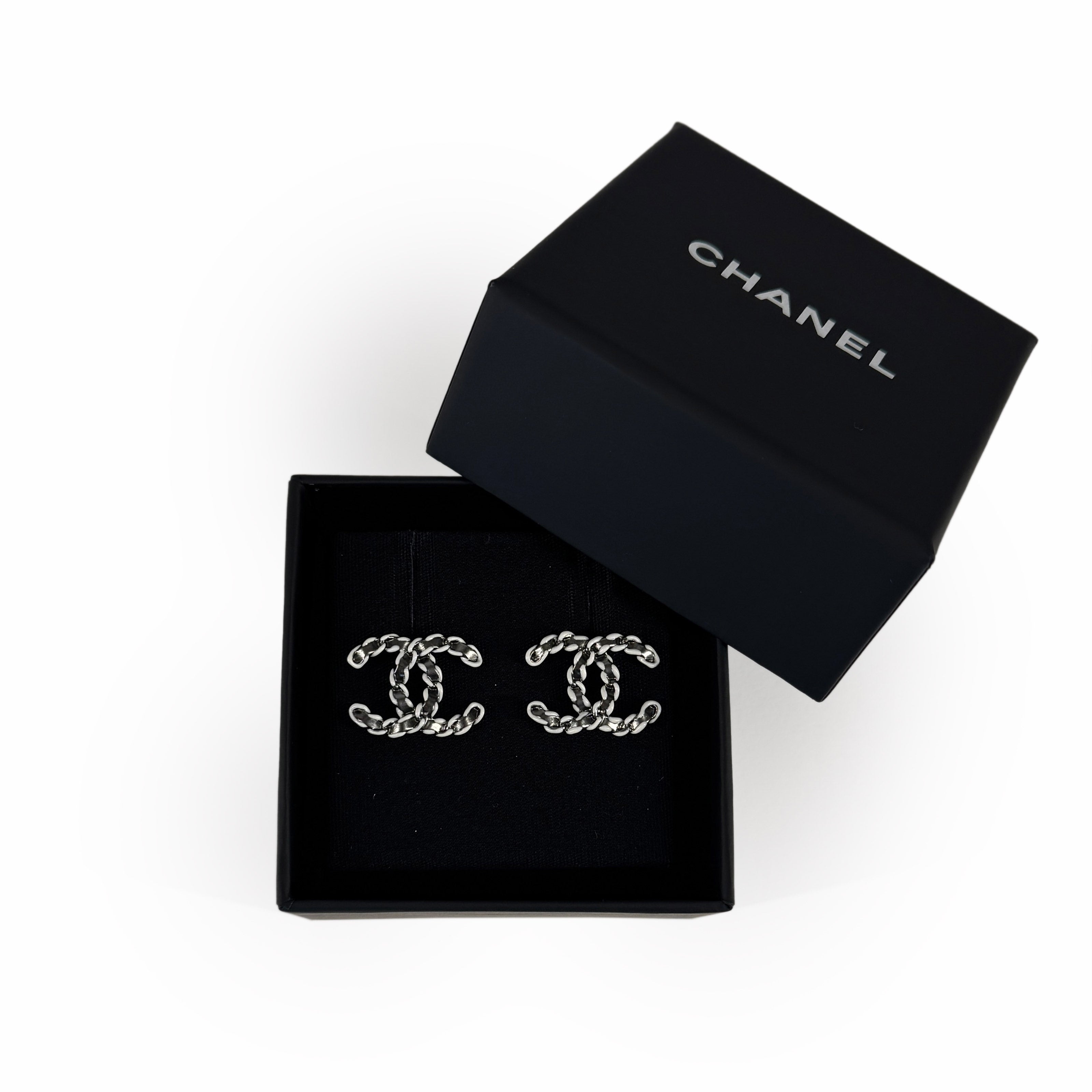 Chanel CC White Metal Gun Earrings